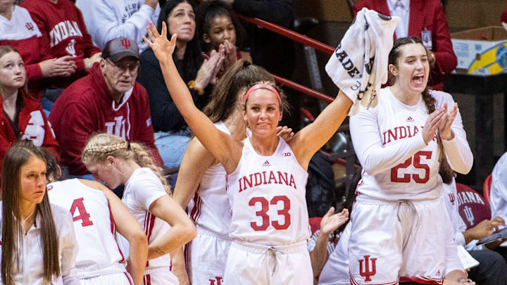 Indiana's Sydney Parrish (33) celebrates a Hoosier three-pointer during the Indiana versus Northwood women's basketball game at Simon Skjodt Assembly Hall on Wednesday, Nov. 1, 2023.