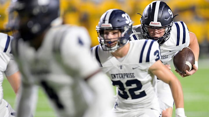 Enterprise's Mason Burkhardt (9) scores a touchdown against Carver during their game at Cramton Bowl in Montgomery, Ala., on Thursday October 3, 2024. Enterprise's Mason Burkhardt (9) scores a touchdown against Carver during their game at Cramton Bowl in Montgomery, Ala., on Thursday October 3, 2024.