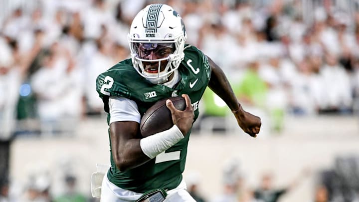 Michigan State's Aidan Chiles runs for a gain against Western Michigan during the second quarter on Friday, Aug. 29, 2025, in East Lansing.