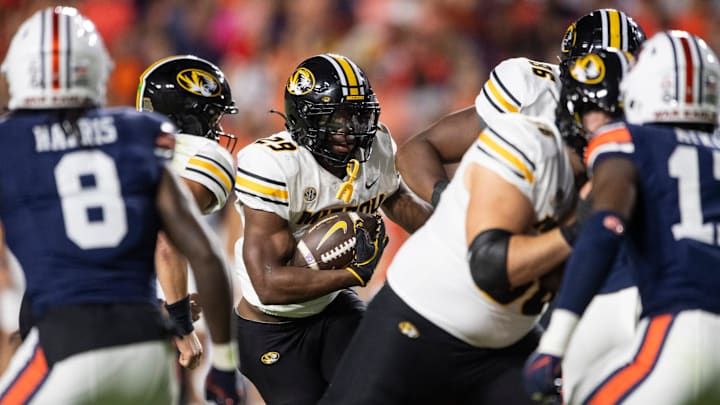 Missouri Tigers running back Ahmad Hardy (29) runs the ball as Auburn Tigers take on Missouri Tigers at Jordan-Hare Stadium in Auburn, Ala. on Saturday, Oct. 18, 2025. Missouri Tigers defeated the Auburn Tigers 23-17 in 2OT.