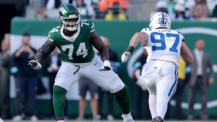 Nov 17, 2024; East Rutherford, New Jersey, USA; New York Jets offensive tackle Olu Fashanu (74) blocks against Indianapolis Colts defensive end Laiatu Latu (97) during the second quarter at MetLife Stadium. Nov 17, 2024; East Rutherford, New Jersey, USA; New York Jets offensive tackle Olu Fashanu (74) blocks against Indianapolis Colts defensive end Laiatu Latu (97) during the second quarter at MetLife Stadium.