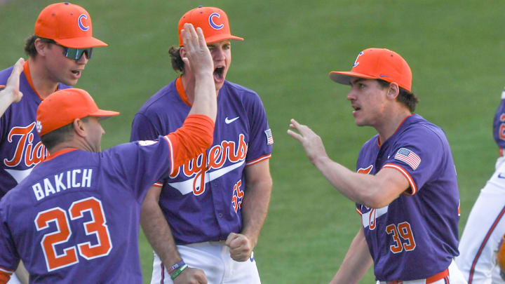 Mar 1, 2025; Greenville, South Carolina, USA; Clemson Tigers pitcher Ethan Darden (39) is congratulated after retiring the South Carolina Gamecocks during the bottom of the sixth inning at Fluor Field