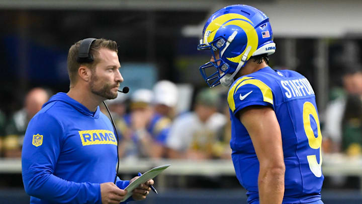 Oct 6, 2024; Inglewood, California, USA; Los Angeles Rams head coach Sean McVay talks to quarterback Matthew Stafford (9) during the third quarter against the Green Bay Packers at SoFi Stadium. Mandatory Credit: Robert Hanashiro-Imagn Images Oct 6, 2024; Inglewood, California, USA; Los Angeles Rams head coach Sean McVay talks to quarterback Matthew Stafford (9) during the third quarter against the Green Bay Packers at SoFi Stadium. Mandatory Credit: Robert Hanashiro-Imagn Images