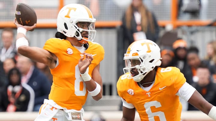 Nov 23, 2024; Knoxville, Tennessee, USA; Tennessee Volunteers quarterback Nico Iamaleava (8) throws a pass as running back Dylan Sampson (6) blocks against the UTEP Miners during the first half at Neyland Stadium.