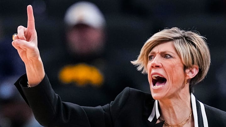 Iowa Hawkeyes head coach Jan Jensen calls out to her team Friday, March 7, 2025, in a quarterfinals game at the 2025 TIAA Big Ten Women's Basketball Tournament between the Iowa Hawkeyes and the Ohio State Buckeyes at Gainbridge Fieldhouse in Indianapolis.