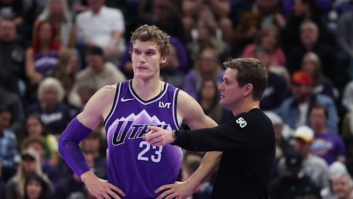 Nov 17, 2023; Salt Lake City, Utah, USA; Utah Jazz forward Lauri Markkanen (23) and head coach Will Hardy speak while the Phoenix Suns shoot free throws in the fourth quarter at Delta Center. Mandatory Credit: Rob Gray-Imagn Images