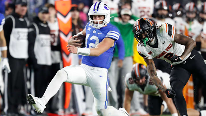 Jake Retzlaff escaped the Oklahoma State defense with his legs to keep the Cougars alive in their late-night victory.