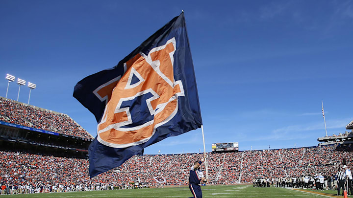 Nov 5, 2016; Auburn, AL, USA;   An Auburn Tigers cheerleader carries a flag through the endzone after the Tigers scored a touchdown against the Vanderbilt Commodores during the third quarter at Jordan Hare Stadium.  The Tigers beat the Commodores 23-16. Mandatory Credit: John Reed-USA TODAY Sports