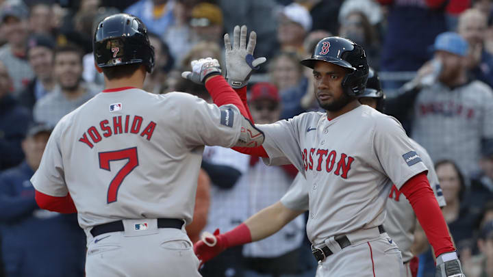 Apr 20, 2024; Pittsburgh, Pennsylvania, USA; Boston Red Sox third baseman Pablo Reyes (19) greets designated hitter  Masataka Yoshida (7) crossing home plate on a two run home run against he Pittsburgh Pirates during the sixth inning at PNC Park. Mandatory Credit: Charles LeClaire-Imagn Images