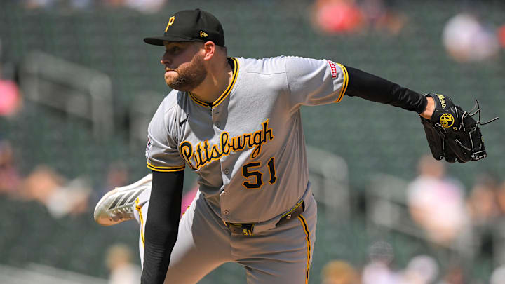 Jul 13, 2025; Minneapolis, Minnesota, USA; Pittsburgh Pirates relief pitcher David Bednar (51) delivers a pitch against the Minnesota Twins during the ninth inning at Target Field. Mandatory Credit: Nick Wosika-Imagn Images