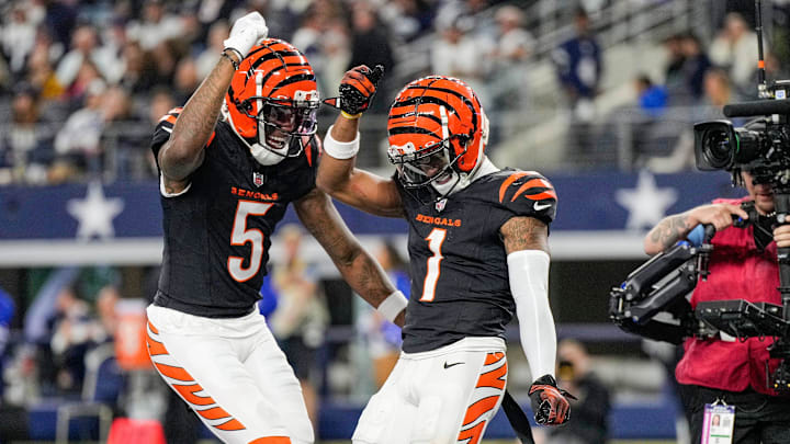 Cincinnati Bengals wide receiver Tee Higgins (5) and wide receiver Ja'Marr Chase (1) dance after Chase scored a touchdown in the 4th quarter to beat the Dallas Cowboys in Monday Night Football at AT&T Stadium in Arlington, Texas on Monday, December 9, 2024.