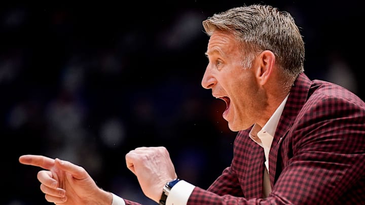 Alabama coach Nate Oats works with his team during the second half of a SEC tournament quarterfinal game against Mississippi at Bridgestone Arena in Nashville, Tenn., Friday, March 13, 2026. Alabama coach Nate Oats works with his team during the second half of a SEC tournament quarterfinal game against Mississippi at Bridgestone Arena in Nashville, Tenn., Friday, March 13, 2026.