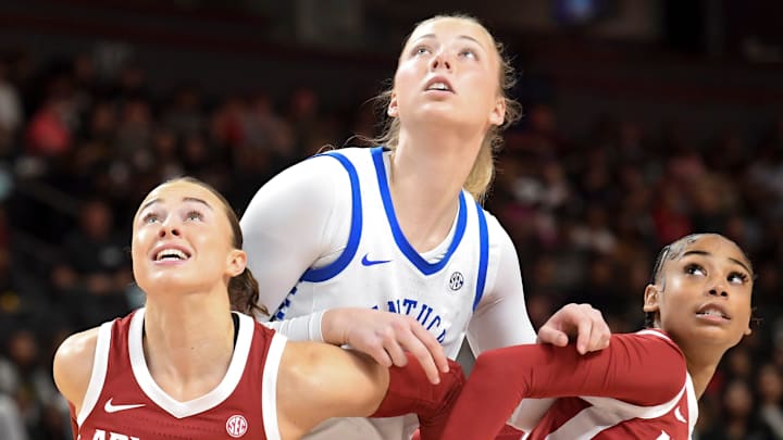 Arkansas Razorbacks guard Bonnie Deas (22) and Arkansas Razorbacks guard Taleyah Jones (10) box out Kentucky Wildcats center Clara Strack (13) Wednesday, March 4, 2026, during the SEC Women's Basketball Tournament first round game at Bon Secours Wellness Arena in Greenville, South Carolina.