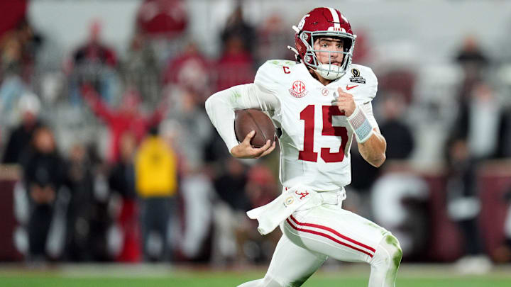 Alabama's Ty Simpson (15) rushes in the second half of the College Football Playoff game against the Oklahoma Sooners