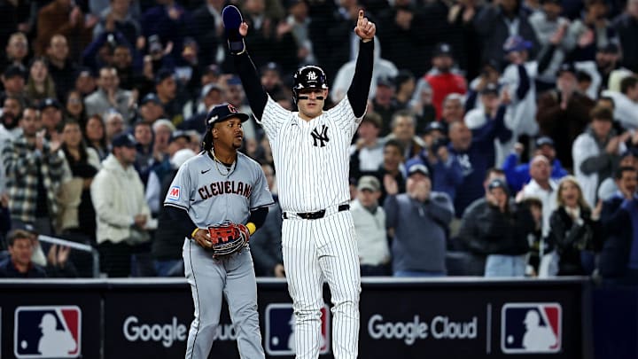 Oct 15, 2024; Bronx, New York, USA; New York Yankees first base Anthony Rizzo (48) celebrates after reaching third base during the second inning against the Cleveland Guardians in game two of the ALCS for the 2024 MLB Playoffs at Yankee Stadium. Mandatory Credit: Wendell Cruz-Imagn Images