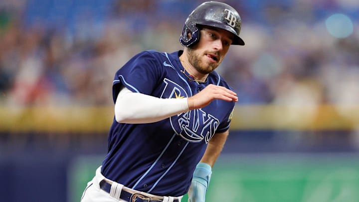 Sep 4, 2023; St. Petersburg, Florida, USA;  Tampa Bay Rays second baseman Brandon Lowe (8) rounds third base to score a run against the Boston Red Sox in the first inning at Tropicana Field.
