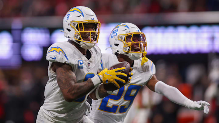 Dec 1, 2024; Atlanta, Georgia, USA; Los Angeles Chargers safety Derwin James Jr. (3) celebrates after an interception with cornerback Tarheeb Still (29) against the Atlanta Falcons in the fourth quarter at Mercedes-Benz Stadium. Mandatory Credit: Brett Davis-Imagn Images Dec 1, 2024; Atlanta, Georgia, USA; Los Angeles Chargers safety Derwin James Jr. (3) celebrates after an interception with cornerback Tarheeb Still (29) against the Atlanta Falcons in the fourth quarter at Mercedes-Benz Stadium. Mandatory Credit: Brett Davis-Imagn Images
