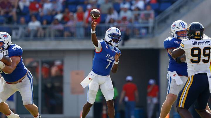 Oct 24, 2026; Dallas, Texas, USA; SMU Mustangs quarterback Kevin Jennings (7) throws a pass against the California Golden Bears during the second half at Gerald J. Ford Stadium. Mandatory Credit: Chris Jones-Imagn Images Oct 24, 2026; Dallas, Texas, USA; SMU Mustangs quarterback Kevin Jennings (7) throws a pass against the California Golden Bears during the second half at Gerald J. Ford Stadium. Mandatory Credit: Chris Jones-Imagn Images