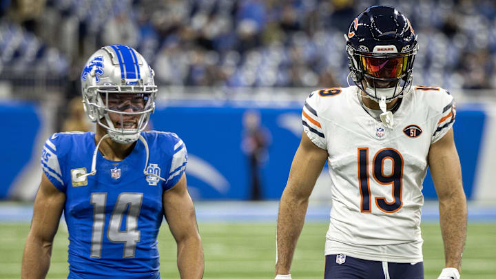 Nov 19, 2023; Detroit, Michigan, USA; Detroit Lions wide receiver Amon-Ra St. Brown (14) and his brother Chicago Bears wide receiver Equanimeous St. Brown (19) in warms up at Ford Field. Mandatory Credit: David Reginek-Imagn Images