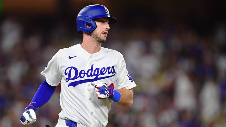 Sep 2, 2026; Los Angeles, California, USA;  Los Angeles Dodgers outfielder Kyle Tucker (23) hits a single during the fifth inning against the St. Louis Cardinals at UNIQLO Field at Dodger Stadium.  Mandatory Credit: Gary A. Vasquez-Imagn Images