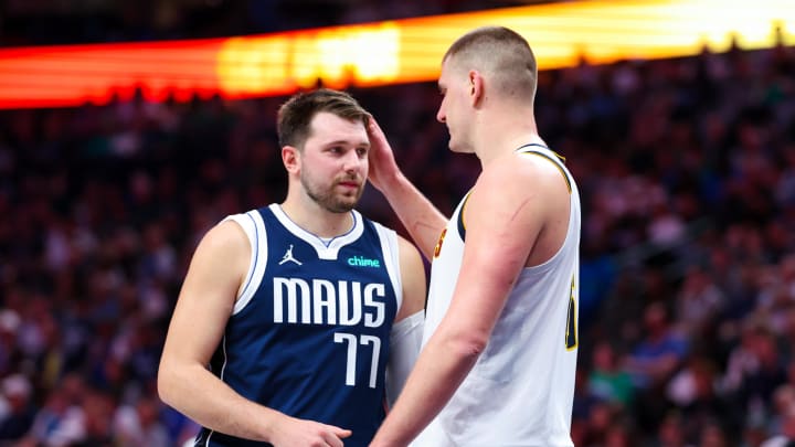 Mar 17, 2024; Dallas, Texas, USA; Dallas Mavericks guard Luka Doncic (77) speaks with Denver Nuggets center Nikola Jokic (15) during the second half at American Airlines Center. Mar 17, 2024; Dallas, Texas, USA; Dallas Mavericks guard Luka Doncic (77) speaks with Denver Nuggets center Nikola Jokic (15) during the second half at American Airlines Center.