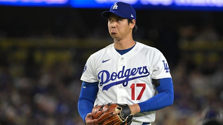 Apr 28, 2026; Los Angeles, California, USA; Los Angeles Dodgers starting pitcher Shohei Ohtani (17) reacts after a pitch in the fifth inning against the Miami Marlins at Dodger Stadium. Mandatory Credit: Jayne Kamin-Oncea-Imagn Images