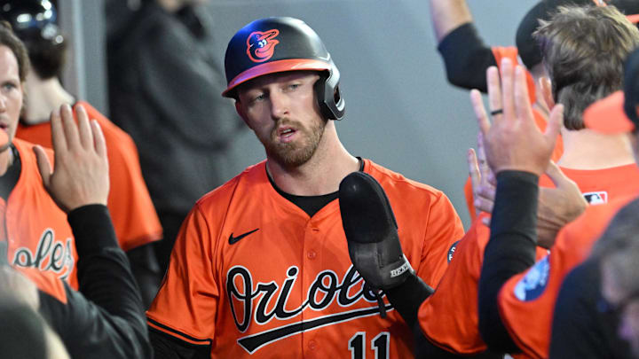 Toronto, Ontario, CAN; Baltimore Orioles second baseman Jordan Westburg (11) celebrates with teammates in the dugout after scoring against the Toronto Blue Jays in the fifth inning at Rogers Centre.