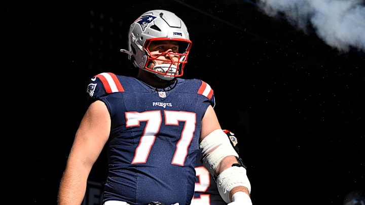 Nov 2, 2025; Foxborough, Massachusetts, USA; New England Patriots center Ben Brown (77) walks out of the player's tunnel before a game against the Atlanta Falcons at Gillette Stadium. Mandatory Credit: Eric Canha-Imagn Images