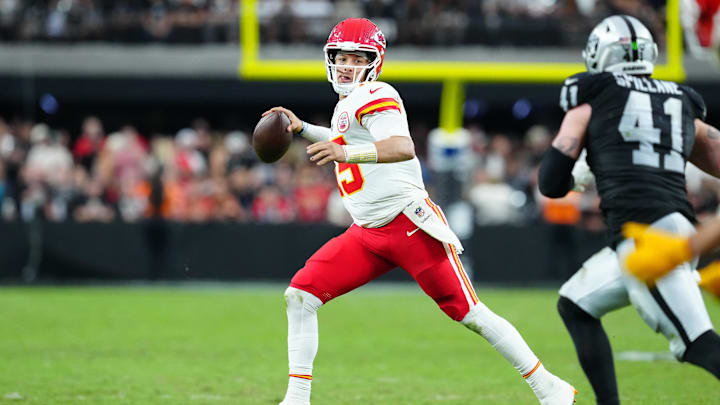 Oct 27, 2024; Paradise, Nevada, USA; Kansas City Chiefs quarterback Patrick Mahomes (15) looks to make a pass against the Las Vegas Raiders during the fourth quarter at Allegiant Stadium. Mandatory Credit: Stephen R. Sylvanie-Imagn Images