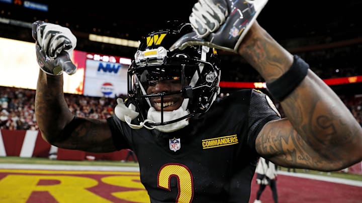 Oct 27, 2024; Landover, Maryland, USA; Washington Commanders wide receiver Dyami Brown (2) celebrates after the Washington Commanders beat the Chicago Bears on a Hail Mary pass with no time left at Commanders Field. 
