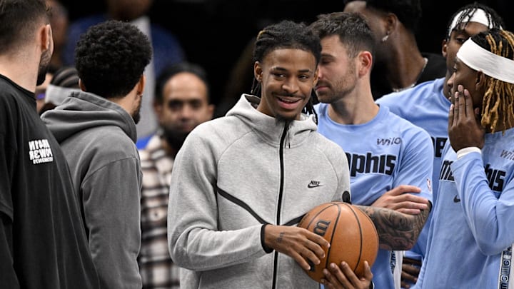 Nov 22, 2025; Dallas, Texas, USA; Memphis Grizzlies guard Ja Morant (12) looks on from the team bench during the second half against the Dallas Mavericks at the American Airlines Center. Mandatory Credit: Jerome Miron-Imagn Images Nov 22, 2025; Dallas, Texas, USA; Memphis Grizzlies guard Ja Morant (12) looks on from the team bench during the second half against the Dallas Mavericks at the American Airlines Center. Mandatory Credit: Jerome Miron-Imagn Images