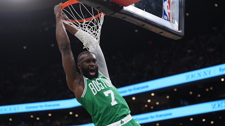 Mar 18, 2026; Boston, Massachusetts, USA; Boston Celtics guard Jaylen Brown (7) makes the basket against the Golden State Warriors  in the first quarter at TD Garden. Mandatory Credit: David Butler II-Imagn Images