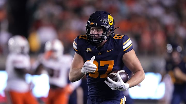 Oct 5, 2024; Berkeley, California, USA; California Golden Bears tight end Jack Endries (87) runs after a catch against the Miami Hurricanes during the first quarter at California Memorial Stadium. Mandatory Credit: Darren Yamashita-Imagn Images Oct 5, 2024; Berkeley, California, USA; California Golden Bears tight end Jack Endries (87) runs after a catch against the Miami Hurricanes during the first quarter at California Memorial Stadium. Mandatory Credit: Darren Yamashita-Imagn Images
