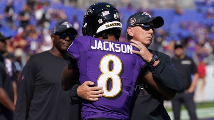 Oct 13, 2024; Baltimore, Maryland, USA; Baltimore Ravens quarterback Lamar Jackson (8) greets offensive coordinator Todd Monken prior to the game against the Washington Commanders at M&T Bank Stadium. Mandatory Credit: Mitch Stringer-Imagn Images