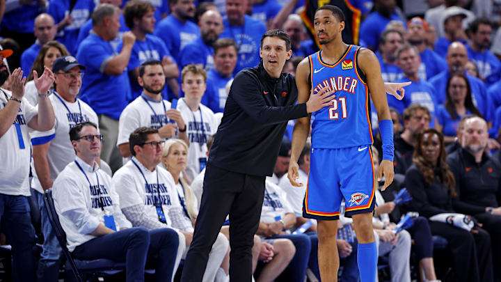 May 28, 2025; Oklahoma City, Oklahoma, USA; Oklahoma City Thunder head coach Mark Daigneault talks with Oklahoma City Thunder guard Aaron Wiggins (21) during the second quarter against the Minnesota Timberwolves in game five of the western conference finals for the 2025 NBA Playoffs at Paycom Center. Mandatory Credit: Alonzo Adams-Imagn Images