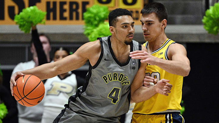 Purdue Boilermakers forward Trey Kaufman-Renn (4) controls the ball Purdue Boilermakers forward Trey Kaufman-Renn (4) controls the ball