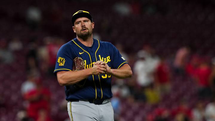 Jun 24, 2026; Cincinnati, Ohio, USA;  Milwaukee Brewers pitcher Joel Kuhnel (59) prepares to throw against the Cincinnati Reds in the ninth inning at Great American Ball Park. Mandatory Credit: Aaron Doster-Imagn Images