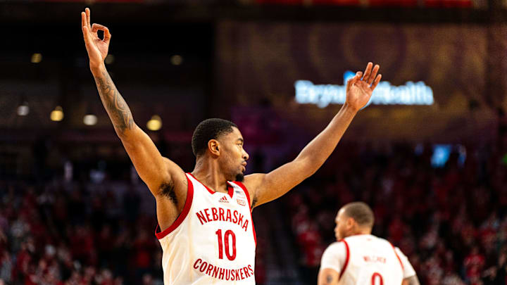 Jamarques Lawrence celebrates after a 3-point shot by forward Rienk Mast against the Ohio State Buckeyes.