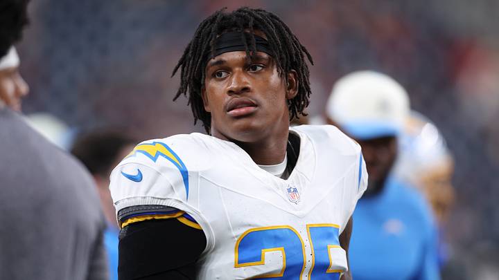 Aug 13, 2026; Houston, Texas, USA;  Los Angeles Chargers linebacker Junior Colson (25) on the sideline during the game against the Houston Texans at Reliant Stadium. Mandatory Credit: Troy Taormina-Imagn Images