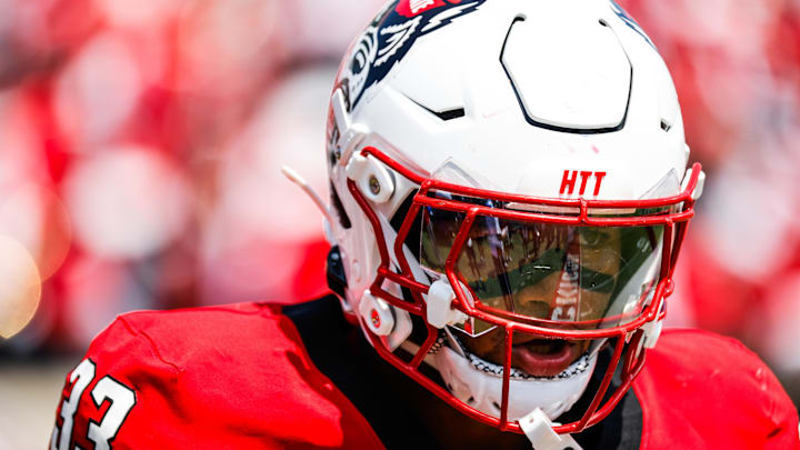 Sep 6, 2025; Raleigh, North Carolina, USA; North Carolina State Wolfpack linebacker Kenny Soares Jr. (33) looks on during the first half of the game against Virginia Cavaliers at Carter-Finley Stadium. Mandatory Credit: Jaylynn Nash-Imagn Images Sep 6, 2025; Raleigh, North Carolina, USA; North Carolina State Wolfpack linebacker Kenny Soares Jr. (33) looks on during the first half of the game against Virginia Cavaliers at Carter-Finley Stadium. Mandatory Credit: Jaylynn Nash-Imagn Images