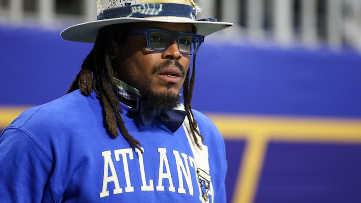 Dec 16, 2023; Atlanta, GA, USA; Former NFL quarterback Cam Newton watches a game between the Howard Bison and Florida A&M Rattlers in the first half at Mercedes-Benz Stadium. 