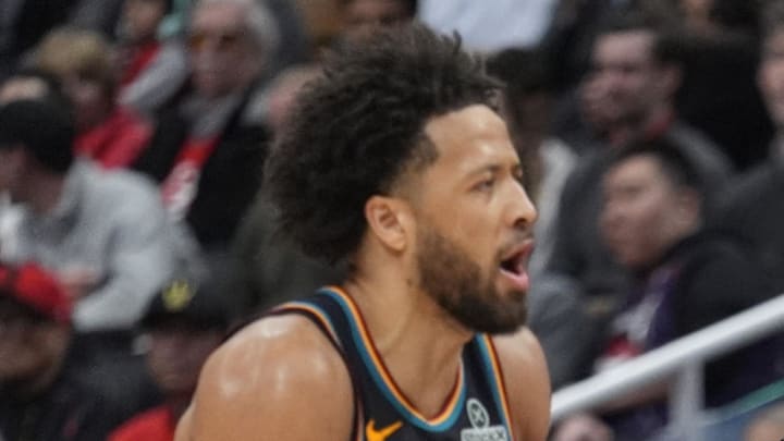 Detroit Pistons head coach J.B. Bickerstaff looks on as guard Cade Cunningham (2) pleads for a call to an official during the second half at Scotiabank Arena on Mar 15, 2026.