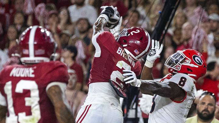 Sep 28, 2024; Tuscaloosa, Alabama, USA; Alabama Crimson Tide defensive back Zabien Brown (2) intercepts a pass in the end zone intended for Georgia Bulldogs wide receiver Colbie Young (8) during the fourth quarter at Bryant-Denny Stadium. Mandatory Credit: Will McLelland-Imagn Images Sep 28, 2024; Tuscaloosa, Alabama, USA; Alabama Crimson Tide defensive back Zabien Brown (2) intercepts a pass in the end zone intended for Georgia Bulldogs wide receiver Colbie Young (8) during the fourth quarter at Bryant-Denny Stadium. Mandatory Credit: Will McLelland-Imagn Images