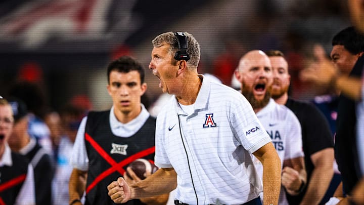 Arizona head coach Brent Brennan celebrating a key play against Kansas State Arizona head coach Brent Brennan celebrating a key play against Kansas State
