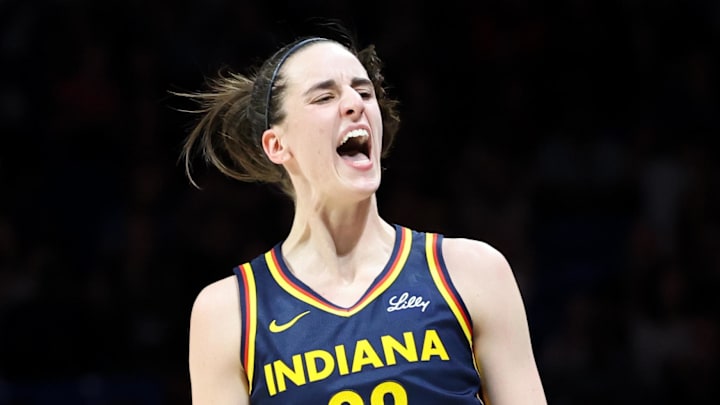 May 3, 2024; Dallas, Texas, USA; Indiana Fever guard Caitlin Clark (22) reacts after scoring during the second quarter against the Dallas Wings at College Park Center. May 3, 2024; Dallas, Texas, USA; Indiana Fever guard Caitlin Clark (22) reacts after scoring during the second quarter against the Dallas Wings at College Park Center.