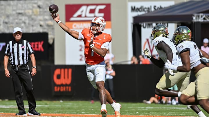 Oct 4, 2025; Blacksburg, Va.; Virginia Tech quarterback Kyron Drones (1) throws a pass against Wake Forest during the second quarter.