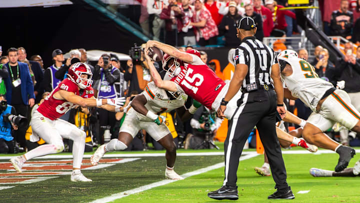 Indiana's Fernando Mendoza (15) scores a touchdown during the College Football Playoff National Championship college football game at Hard Rock Stadium in Miami Gardens on Monday, Jan. 19, 2026.