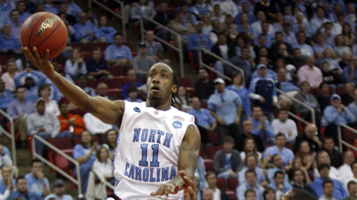 Mar 23, 2008; Raleigh, NC, USA; North Carolina Tar Heels guard Quentin Thomas (11) shoots as Arkansas Razorbacks guard Marcus Britt (12) defends in the first half in the 2nd round of the 2008 NCAA Mens Basketball Tournament at the RBC Center. Mar 23, 2008; Raleigh, NC, USA; North Carolina Tar Heels guard Quentin Thomas (11) shoots as Arkansas Razorbacks guard Marcus Britt (12) defends in the first half in the 2nd round of the 2008 NCAA Mens Basketball Tournament at the RBC Center.