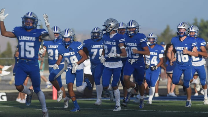 Bishop Manogue defeated McQueen, 36-29, on Friday night.