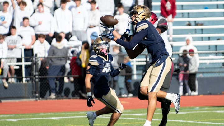 La Salle defensive back Joey O'Brien intercepts a pass intended for St. Joseph's Prep Jett Harrison in a Philadelphia Catholic League championship football game, Saturday, Nov. 1, 2025, at Villanova Stadium in Radnor. The Explorers defeated the Hawks 24-14 for the title. La Salle defensive back Joey O'Brien intercepts a pass intended for St. Joseph's Prep Jett Harrison in a Philadelphia Catholic League championship football game, Saturday, Nov. 1, 2025, at Villanova Stadium in Radnor. The Explorers defeated the Hawks 24-14 for the title.